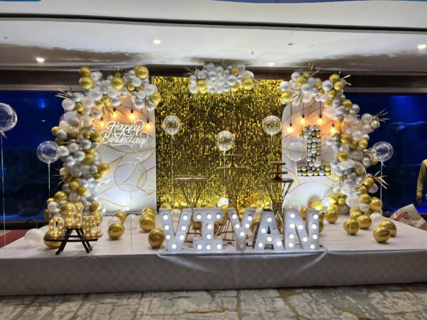 golden sequin backdrop setup